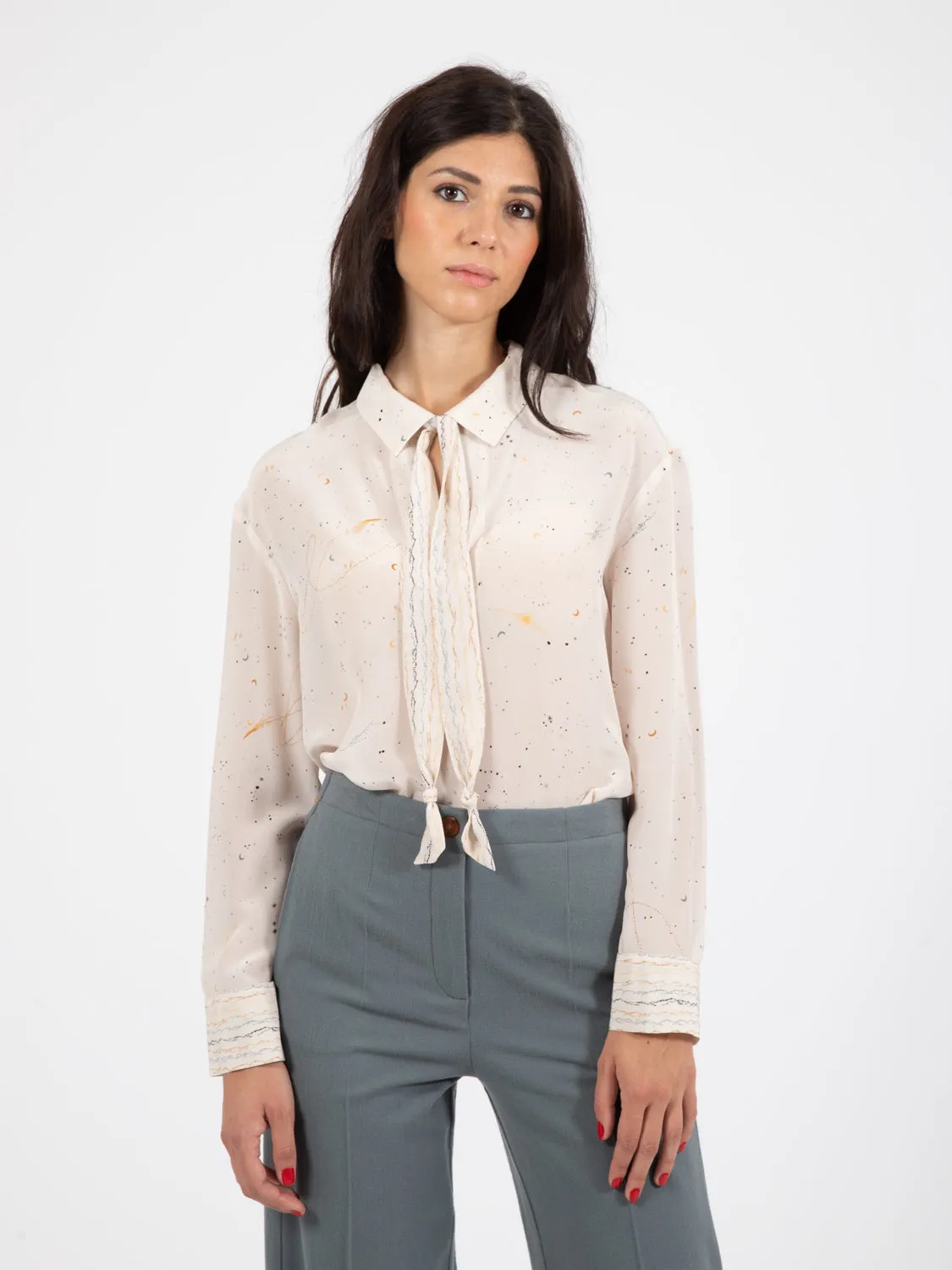 Blusa astro print crema