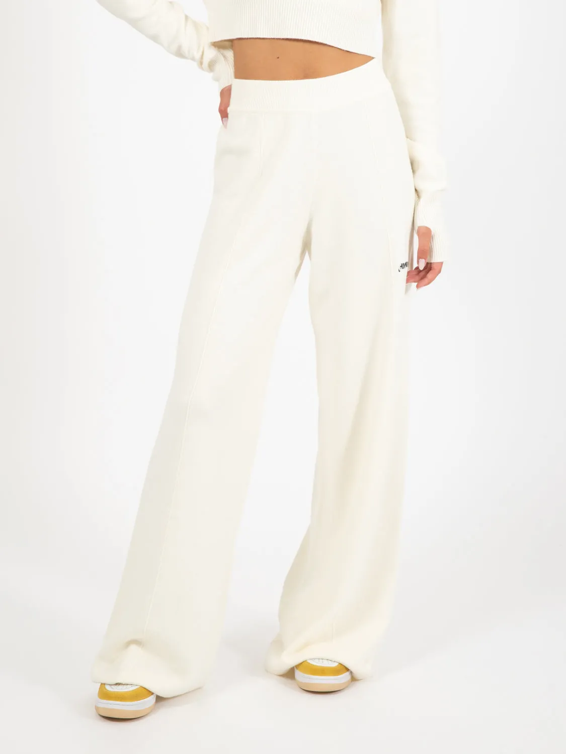 Pantalone palazzo con nervature e ricamo bianco burro