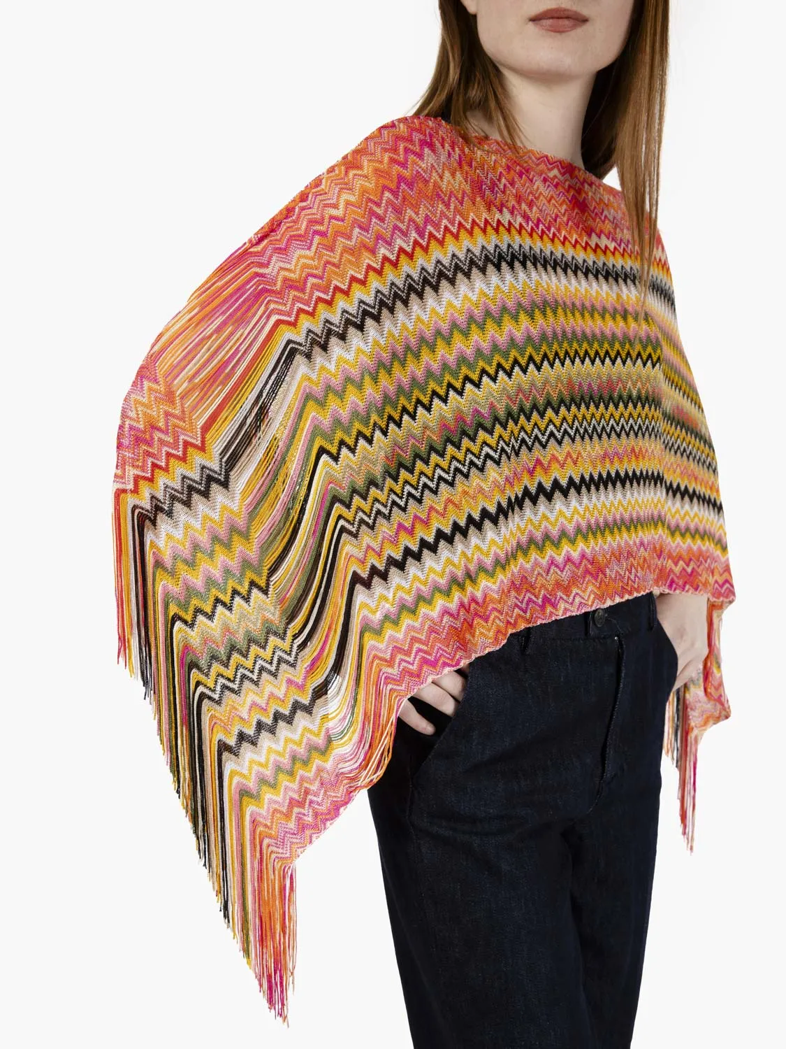 Poncho corto con frange arancio