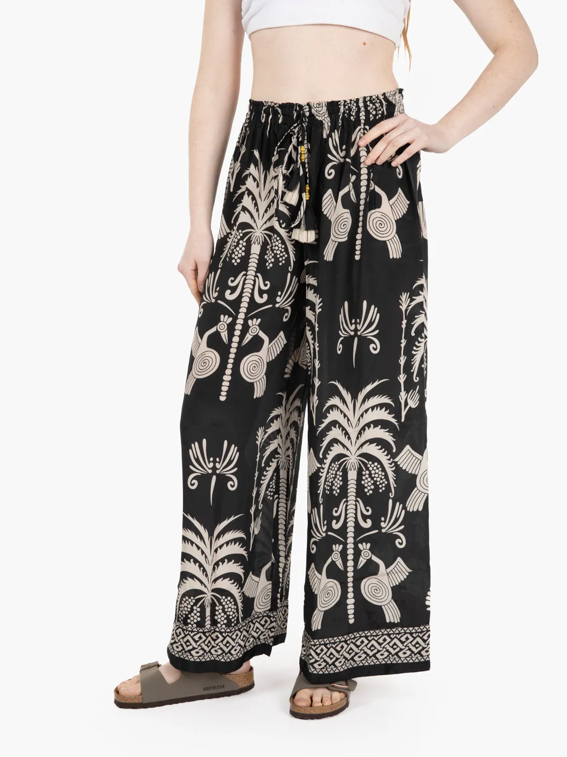 Pantaloni palazzo con nappine nero / bianco